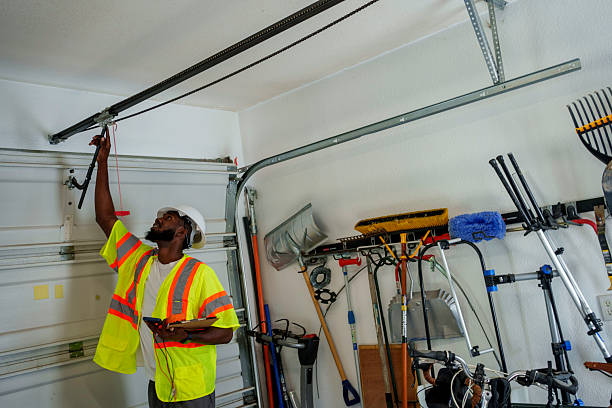 Professional Garage Door Panel Replacement technician working in Olcott, NY